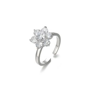 Detail of adjustable silver ring with seven sparkling cubic zirconia in sunflower design