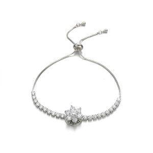 Macro detail of silver adjustable slider buckle and sunflower pendant with zircon stones