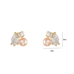 Geometric gold stud earrings with freshwater pearl and clear crystals in 8x8mm size