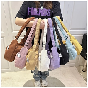 Corduroy crescent shoulder bags in eight colors with cute puppy charms and adjustable straps