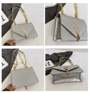 Detail view of silver sequin crossbody bag with gold chain strap and stylish tassel buckle