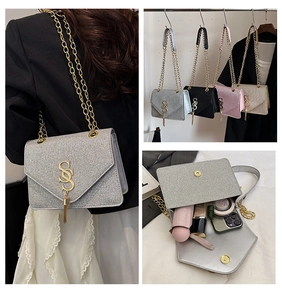 Detail view of glitter chain bags with SSS logo and tassels in four elegant colors