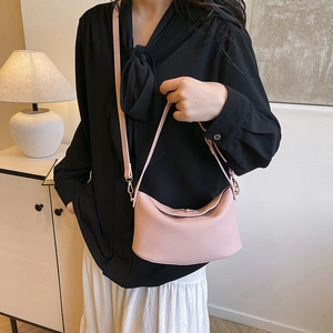 Pink litchi grain leather bucket bag with unique folded structure for women