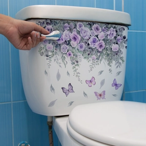 Floral toilet sticker with purple roses and butterflies on white ceramic water tank