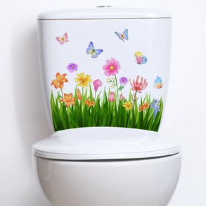 Detail of floral wall sticker with colorful lilies and butterflies on a white background