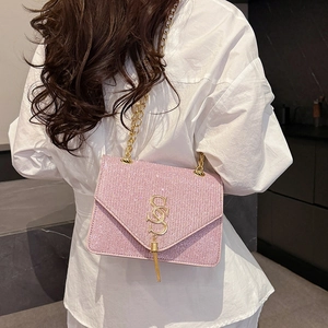Sac bandoulière à paillettes roses avec logo SS doré et détail de pompon pour femme