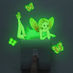 Glow in the dark wall stickers with fairy and butterflies around a light switch panel