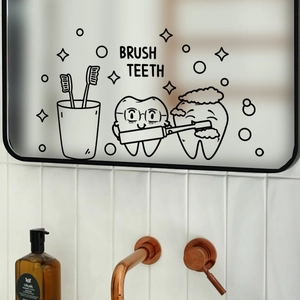 Detail of Brush Teeth wall decal on bathroom mirror with cartoon teeth and soap dispenser