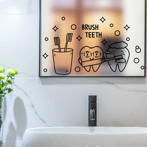 Cartoon brush teeth wall sticker on bathroom mirror with minimalist sink and black faucet