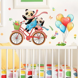 Detail of cartoon pandas riding bicycle with heart balloons on nursery room wall decal