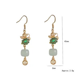 Traditional Hetian Jade butterfly earrings in gold finish with 45mm length size guide