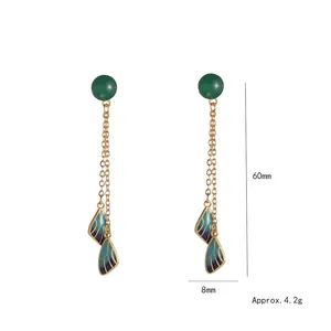 Vintage butterfly wing tassel earrings with green chalcedony and blue enamel drops