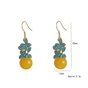 Vintage gold plated flower earrings with blue enamel and yellow agate beads