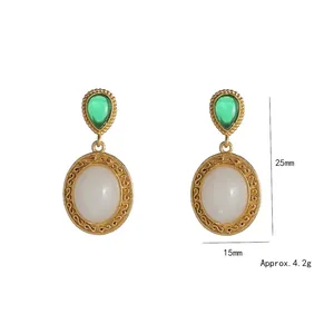 Retro gold earrings with green pear-shaped gem and white oval jade, 25mm height