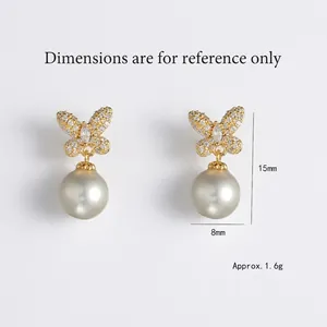 Vintage style bow knot pearl drop earrings with pave crystals and gold alloy finish