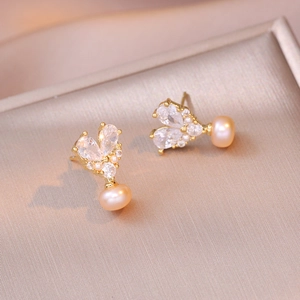 Elegant gold earrings with heart-shaped zircon stones and natural freshwater pearls