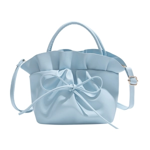 Light blue ruffled clouds bag with sweet bow and adjustable strap for crossbody wear