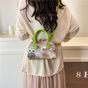Green shell bag with owl floral print and 3D flower accents, handheld or crossbody