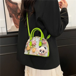 Floral crochet shell bag with 3D panda and flowers, green handle and crossbody strap