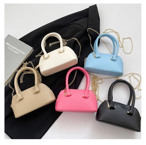 Mini shell bags in lychee leather textures with gold chains and various color options