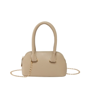 Mini shell-shaped crossbody bag in beige lychee leather with golden chain strap