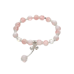 Pink crystal beaded bracelet with silver bells and charms for women in minimalist style
