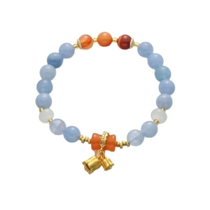 Bracciale bohémien con ciondoli a mughetto dorati e perline colorate miste
