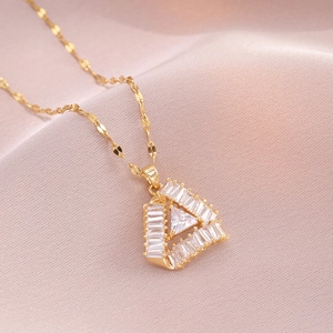 Elegant gold titanium steel necklace with a geometric triangle zircon pendant on silk