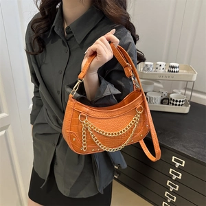 Vibrant orange crocodile-patterned hobo bag with dual gold chain and leather strap