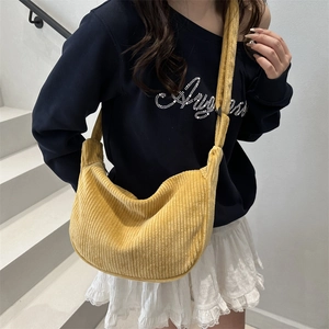 Japanese style corduroy crescent shoulder bag in ginger yellow with a casual minimalist design