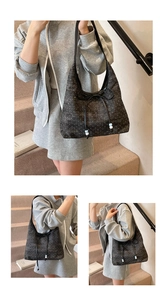 Detailansicht der Hobo-Tasche aus gepunktetem Stoff mit Schleife und Perlen-Kordelzug