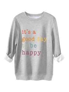 Detail of the warm white fleece lining and colorful rainbow lettering on the grey sweatshirt