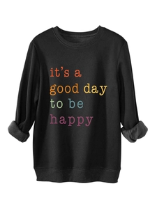 Detail of soft gray fleece lining and colorful slogan print on black long sleeve sweatshirt