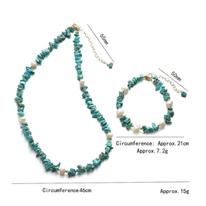 Bohemian jewelry set with turquoise stones and white pearls on gold necklace and bracelet