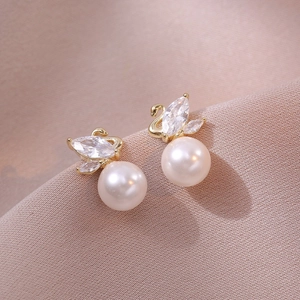 Elegant gold swan stud earrings with white pearls and sparkling crystal stones