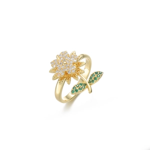 Anello girasole rotante in oro con zirconi brillanti e dettaglio di foglia verde