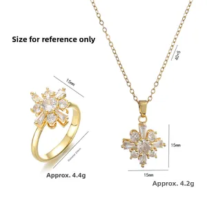 Rotating floral pendant necklace and ring set in gold plated titanium steel for women
