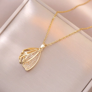 Elegant gold double-layer wing necklace with sparkling zircon pavé on leather jewelry box