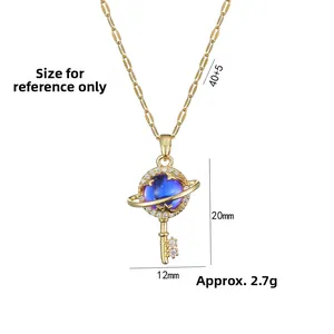 Detail view of gold planet key necklace with dimensions and weight measurements