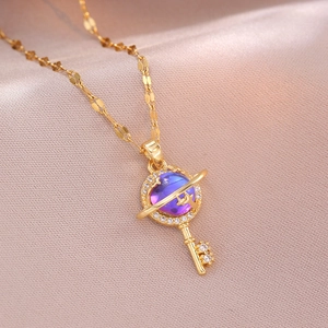 Gold planet key pendant necklace with purple zircon and shimmering sequins chain