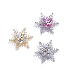 Snowflake brooch with sparkling zircons in gold and silver finish for women