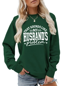 Detail of dark green sweatshirt with white That Sounds Like My Husband's Problem slogan print