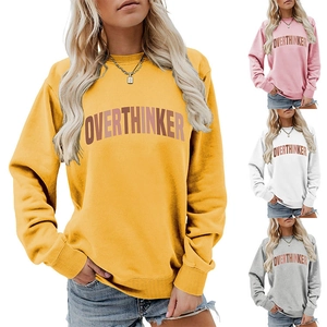 Detail view of colorful crewneck sweatshirts with OVERTHINKER letter print and ribbed cuffs