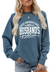 Detail of blue sweatshirt featuring the slogan That Sounds Like My Husband's Problem