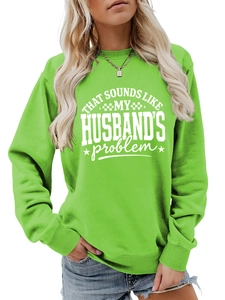 Close-up of bright green crewneck sweatshirt with white slogan print and ribbed cuffs