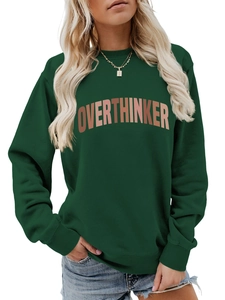Detail of OVERTHINKER print on dark green crewneck sweatshirt with ribbed knit texture