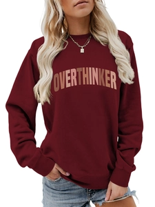 Close-up of Overthinker print on burgundy crewneck sweatshirt with ribbed cuffs