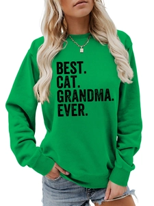 Close-up of Best Cat Grandma Ever print on kelly green long sleeve crewneck sweatshirt