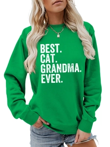 Detailed close-up of Best Cat Grandma Ever print on bright green crewneck sweatshirt