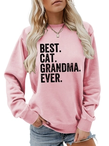 Detail of pink crewneck sweatshirt with Best Cat Grandma Ever print on soft fabric